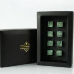 Black box with green chocolate pieces