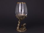 Elegant glass with ornate lion base