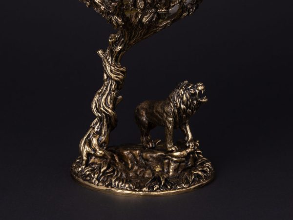 Lion statue on ornate base